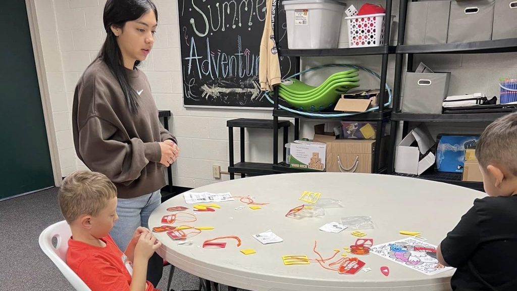 Kids making crafts with supervision